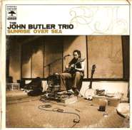 John Butler Trio Sunrise over sea